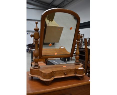 A Victorian toilet mirror on drawer base, light stain, some historical worm been treated