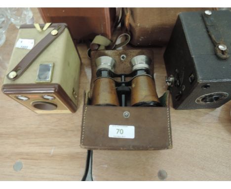 A vintage Bownie Flash IV camera, a Kodak Brownie No.2 and a pair of Lumiere, Paris opera glasses/binoculars