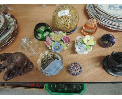 A selection of miscellaneous including small Strathearb paperweight , carpet bowl, japanese carving etc