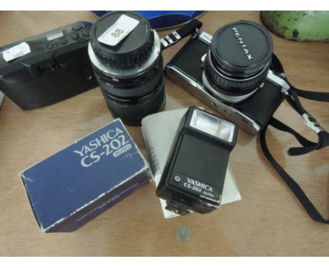 A Pentax camera, Yashica flash, Tamron lens etc 