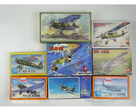 A  group of 1:72 scale unbuilt plastic model kits by various manufacturers - mostly Polish examples - all military aircraft -