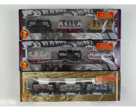 A group of BACHMANN OO gauge triple wagon packs comprising 2 x different Tank Traffic Classics and 1 x Coal Traders Classics 