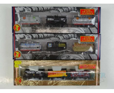 A group of BACHMANN OO gauge triple wagon packs comprising 2 x different Tank Traffic Classics and 1 x Coal Traders Classics 