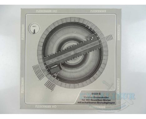 A FLEISCHMANN HO gauge 6651C electrically operated turntable, appears complete - G/VG in a G box