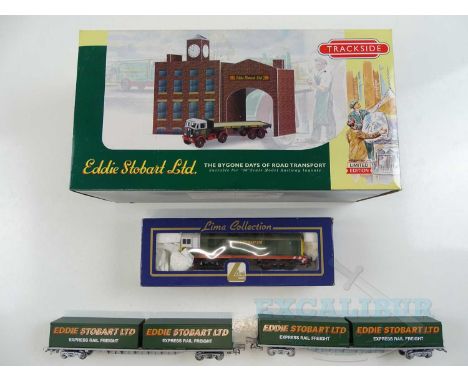 A LIMA OO gauge Class 20 diesel locomotive in Eddie Stobart livery together with a pair of matching container wagons and a LL
