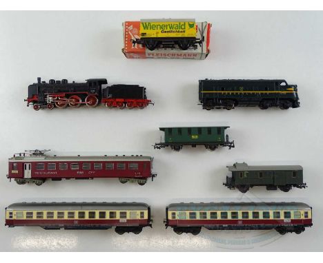 A quantity of mostly unboxed HO gauge German outline rolling stock by FLEISCHMANN together with an American TYCO Pennsylvania