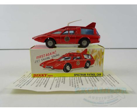 A DINKY 103 Gerry Anderson's 'Captain Scarlet' Spectrum Patrol Car in metallic red complete with instructions, jet engine sou