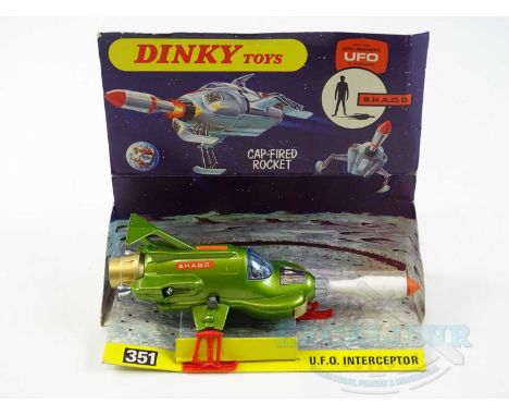 A DINKY 351 Gerry Anderson's 'UFO' Interceptor in metallic green with missile, pictorial card box and original warning leafle