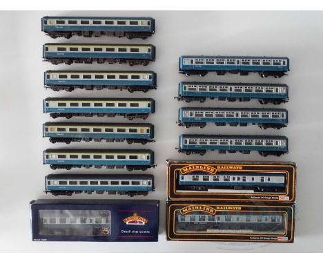 A quantity of OO gauge passenger coaches by BACHMANN, MAINLINE, AIRFIX etc. all in BR blue /grey livery - G/VG in F/G boxes (