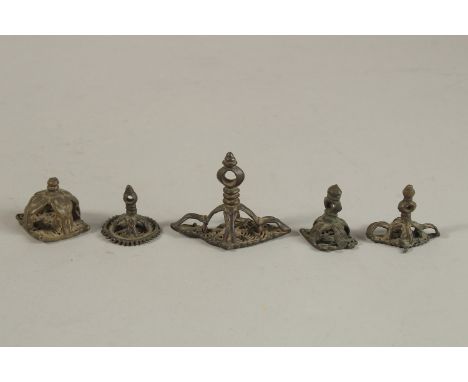 A GROUP OF FIVE 17TH CENTURY TIBETAN OR SOUTH INDIAN BUDDHIST BRONZE STAMPS, (5).