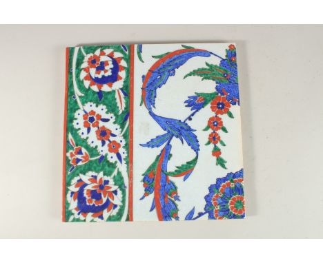 A LARGE TURKISH IZNIK GLAZED POTTERY TILE, 27cm square.