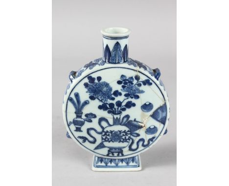 AN 18TH-19TH CENTURY CHINESE BLUE AND WHITE PORCELAIN MOON FLASK, painted with a central vase of flowers and other objects, (