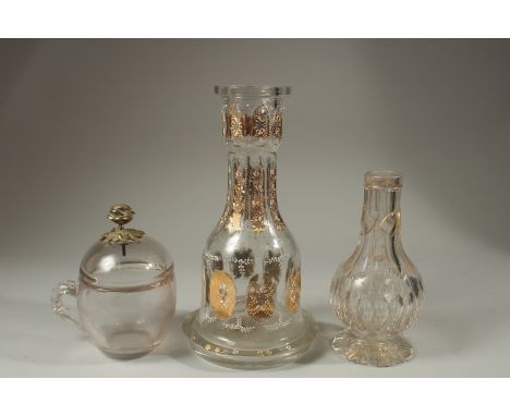 TWO 19TH CENTURY OTTOMAN MARKET GILDED GLASS HUQQA BASES, and another 19th century Ottoman Turkish lidded cup with brass flow