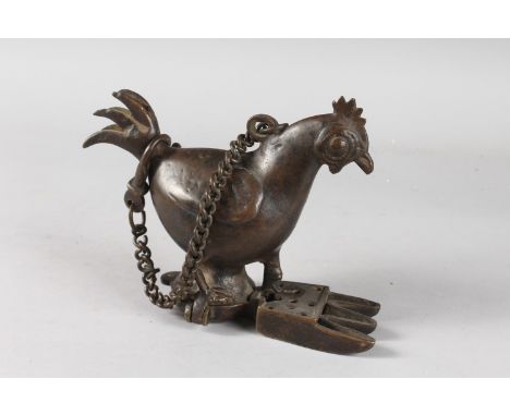 A 19TH CENTURY INDIAN BRONZE CHICKEN SHAPE OIL LAMP, bronze 20cm wide.