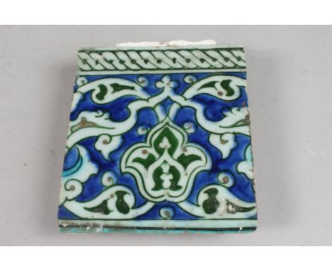 A FINE 16TH CENTURY OTTOMAN  TURKISH IZNIK TILE, 13.5cm x 15cm.