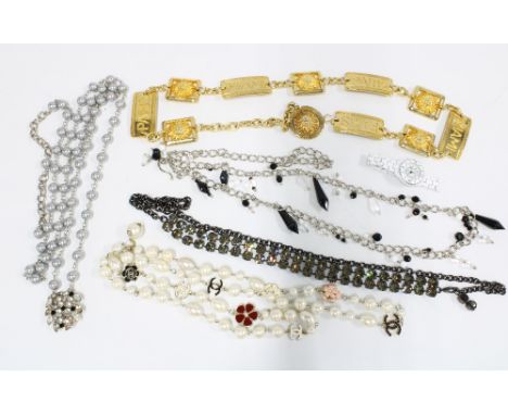 A heavy gilt metal 'Paris' belt, Maxmara beads, Chanel style beads and Chanel style wrist watch (a lot) 