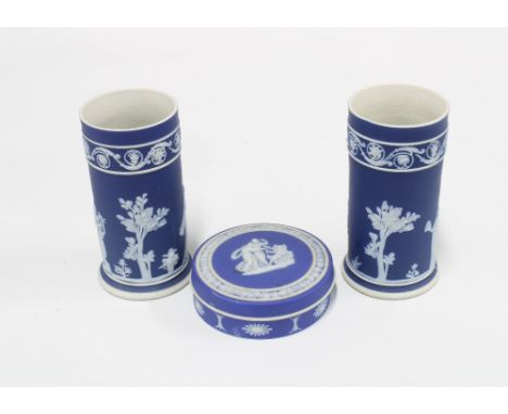 A pair of Wedgwood blue and white Jasper ware vases, 13cm,&nbsp; and a matching trinket box, (3)