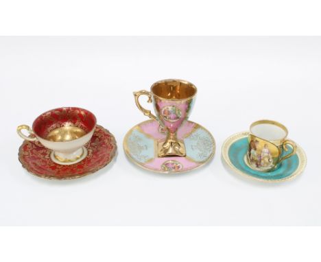 A collection of three continental porcelain cabinet cups and saucers (3) 