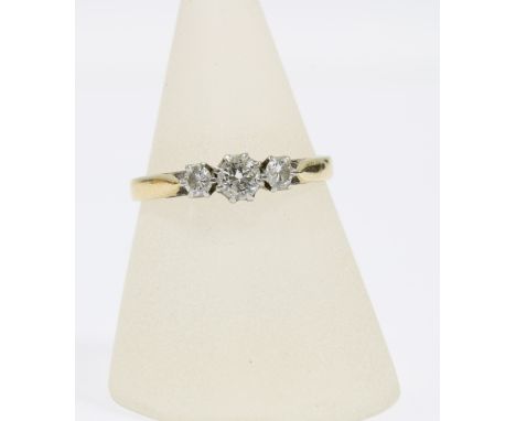 18ct gold and platinum diamond ring, claw set with three brilliant cut diamonds, inner band dated '66, size R 