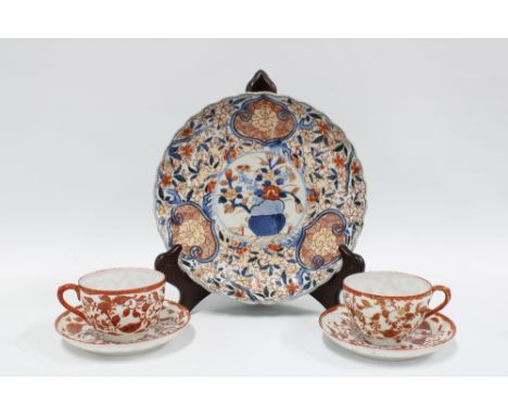 Imari scalloped dish and two Japanese porcelain cups and saucers (5) 22cm.