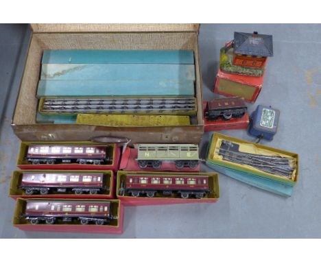Suitcase containing a collection of vintage Hornby carriages and track, etc  (a lot) 