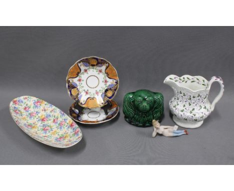 Mixed lot to include a bisque figure, Staffordshire green glazed spaniel, chintz dish, clover jug and imari saucers, etc (a l