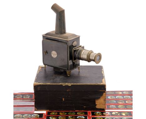 AN ERNST PLANK 'THE STANDARD' MAGIC LANTERN complete with carrying box and with a number of Magic Lantern slides to include o
