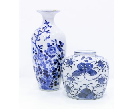 A 19TH CENTURY CHINESE BLUE AND WHITE VASE decorated with flowers and birds with a Kangxi mark to the base 9cm in height, a f