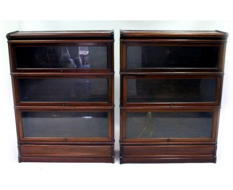 A PAIR OF GLOBE WERNICKE MAHOGANY THREE STACK BOOKCASES each 86cm wide x 27cm deep x 115cm high 