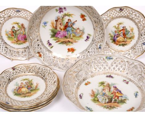 A GERMAN, SCHUMANN PORCELAIN DESSERT SERVICE consisting of a pair of bowls with pierced edges and decorated with figures play