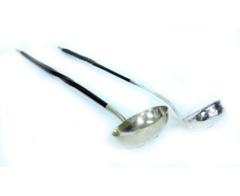 A 19TH CENTURY WHITE METAL TODDIE LADLE 33cm in length and a further silver plated toddie ladle (2)