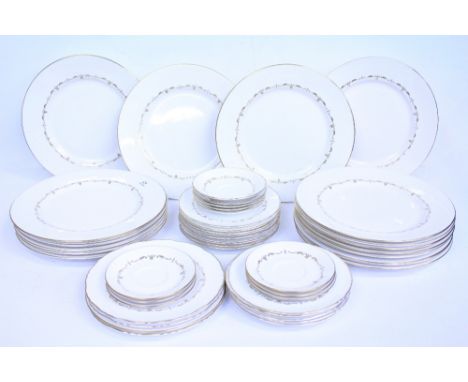 A GROUP OF ROYAL WORCESTER GOLD CHANTILLY PATTERN DINNER PLATES 38 plates 27cm diameter, 30 plates 20.5cm diameter, a large n