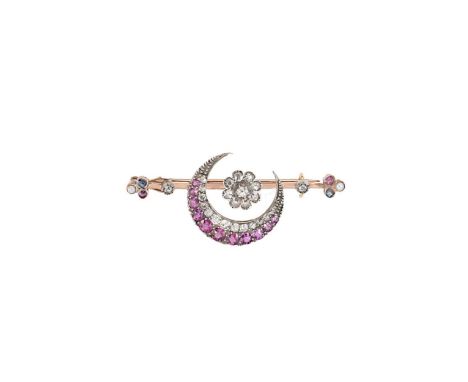 A late Victorian ruby, diamond, sapphire and split pearl crescent brooch, central diamond set daisy cluster, surrounded by a 