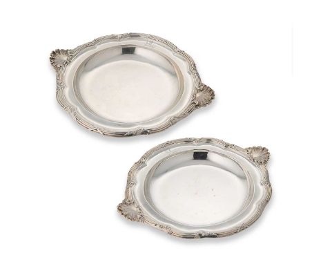 A pair of Victorian silver vegetable dishes, mark of John Samuel Hunt, London 1857, each of circular scalloped form, crested 