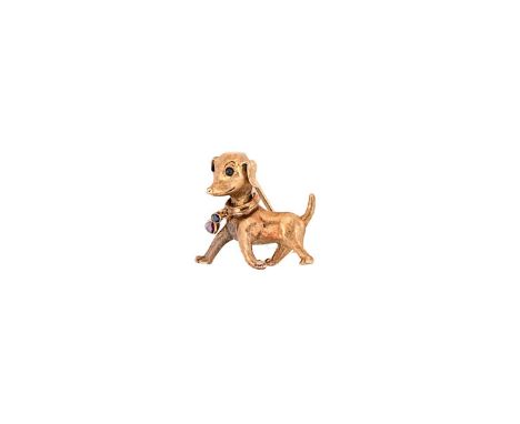 A gemset novelty dog brooch, realistically designed with a textured finish and a collar set with a ruby and sapphire, dimensi
