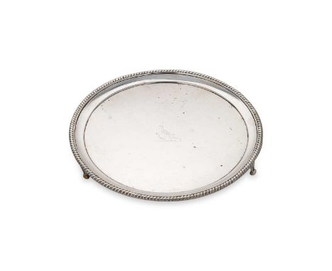A George III silver waiter, mark of Robert Garrard I, together with another, London 1805, of circular form with gadrooned rim