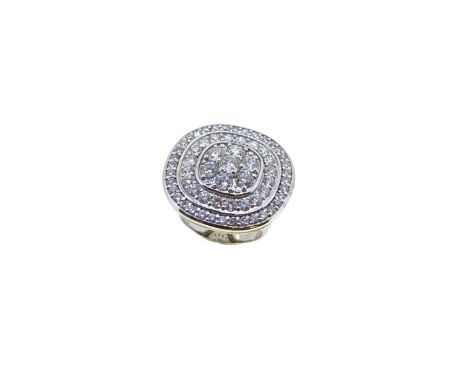 A cushion shaped diamond set cluster ring, central cluster of seven round brilliant cut diamonds, surrounded by two rows of d