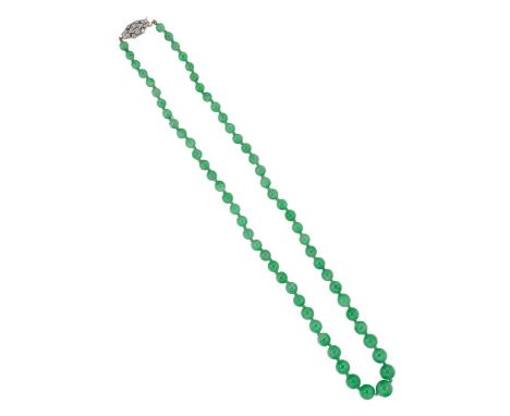 An early twentieth century single row jade bead necklace, sixty four beads, diameter from approximately 5.1 to 9.40mm, length