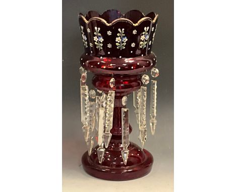 A late Victorian ruby glass lustre, pained with stylised flowers, two rows of clear glass lustres, 36cm high, c.1870 