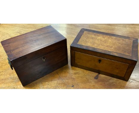 A 19th century mahogany rectangular tea caddy, the interior with two lidded compartments, loose ring handles to sides, 13.5cm