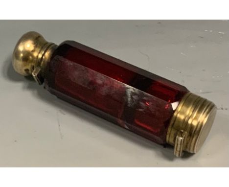 A Victorian ruby glass doubled ended scent/vinaigrette, domed hinged cover, 9cm high, c.1870 