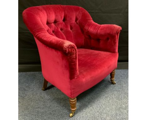 A Victorian mahogany side chair, c.1870deep button back, turned legs, brass casters 