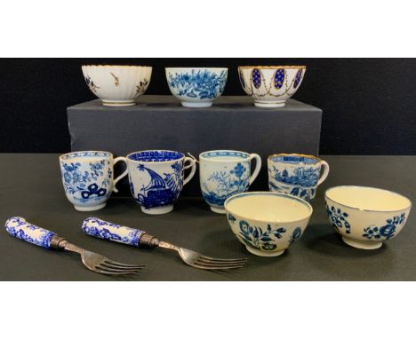 A Worcester Three Flowers tea bowl, crescent mark, c.1770;  another;  a Fruit Sprays tea bowl;  Caughley fluted teabowl;  a W