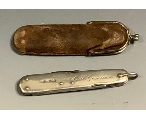 A Victorian silver multi-tool pocket knife, by Lund, Cornhill, with six folding implements comprising knife blade, penknife, 