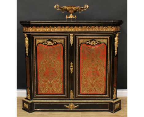 A 19th century gilt metal mounted Boulle and ebonised enclosed side cabinet, hipped rectangular top above a deep frieze appli