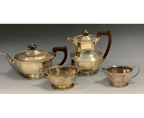 A silver four piece panelled boat shaped tea service, gadrooned border, hotwater jug 20cm high, Collingwood &amp; Sons Ltd, B