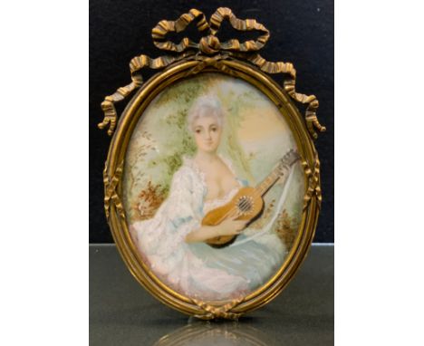 English School, 19th century, a portrait miniature, of a beauty, playing a mandolin, watercolour on ivory, oval, 8.5cm x 6.5c