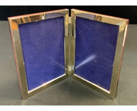 A Chinese silver diptych photograph frame, quite plain, 15cm high, retailed by Waikee, Hong Kong, boxed 