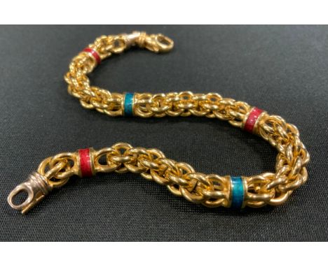 An 18ct gold fancy link bracelet divided by five alternate enamelled bands in emerald green and ruby red, stamped 750, indist