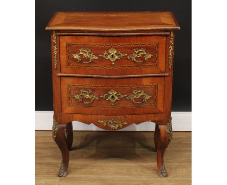 A 19th century French gilt metal mounted walnut commode, moulded crossbanded top above a slide and two drawers, the fronts in